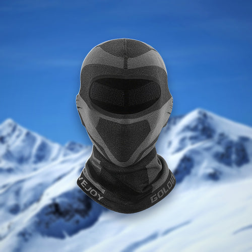 Ski balaclava, medium length, covering face and neck, on a snowy mountain backdrop