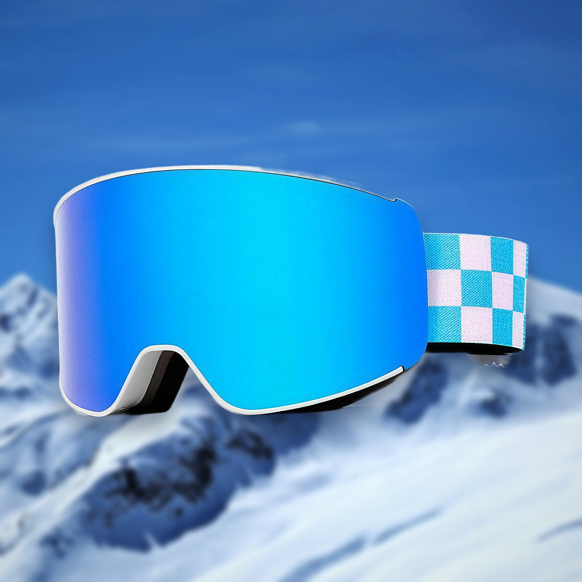 Alpine spherical anti-fog ski goggles, Ice Blue lens, on a snowy mountain backdrop